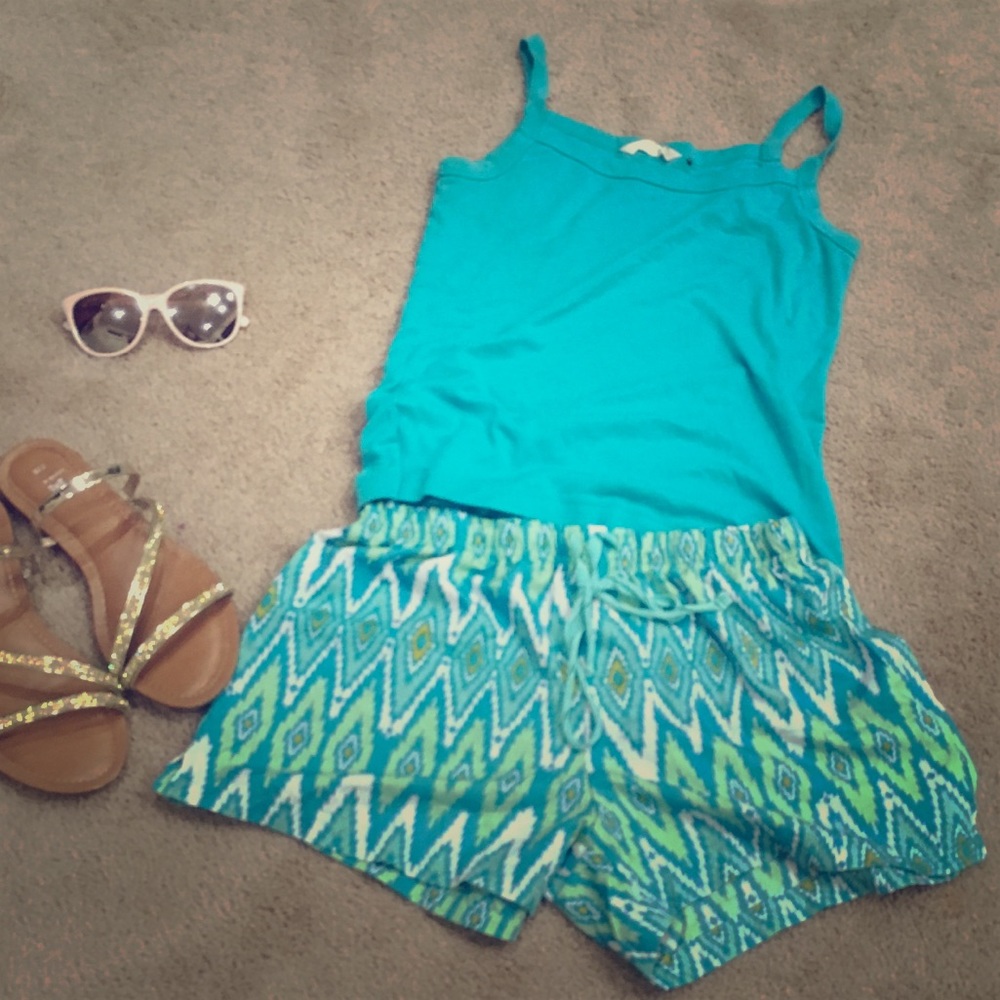 💯% polyester tribal print shorts